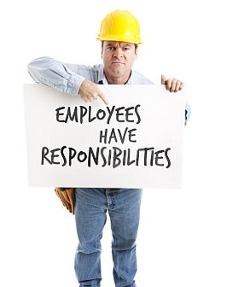man holding responsibility sign