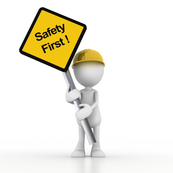 Cartoon of man holding safety first sign