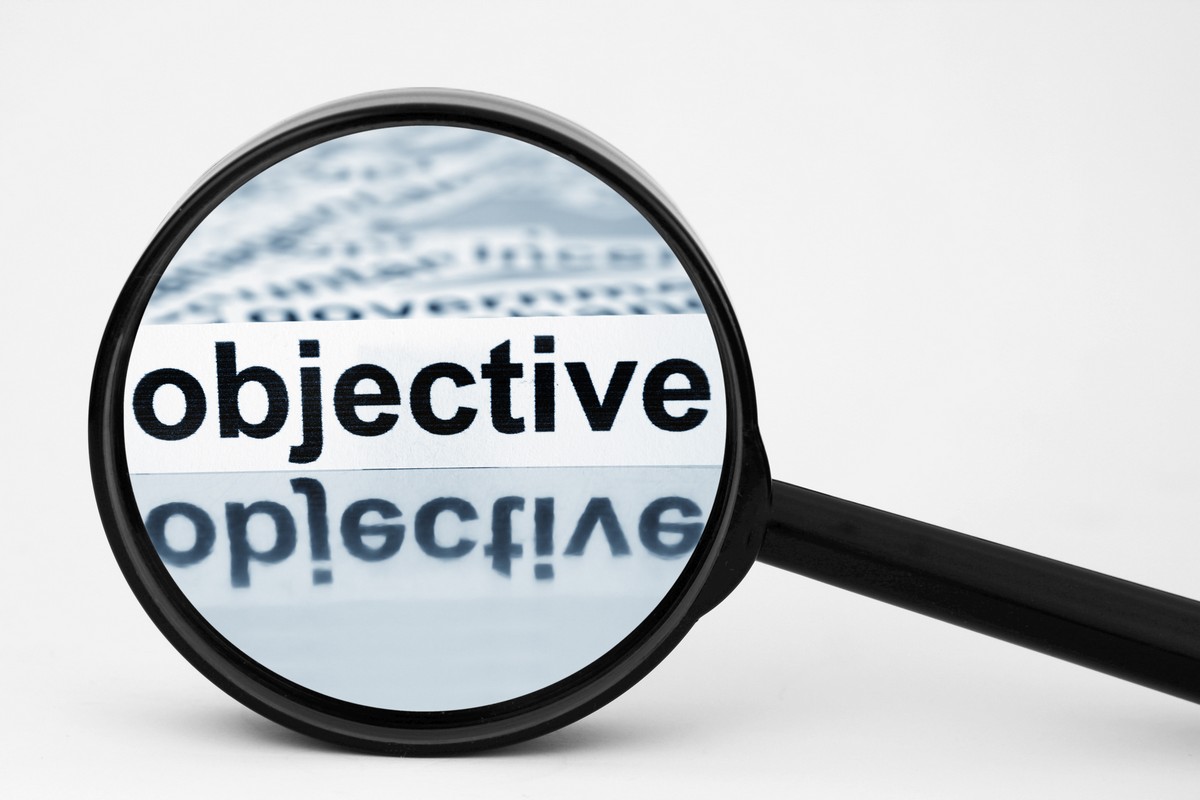 Magnifying Glass with Objective written in it